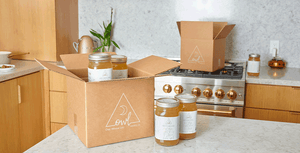 8-Pack of OWL Broth Elixirs on kitchen counter