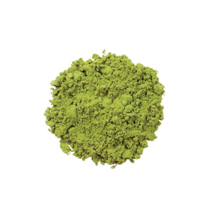 Matcha for bone broth shake, showcasing a vibrant green mound of matcha powder on a clean white background